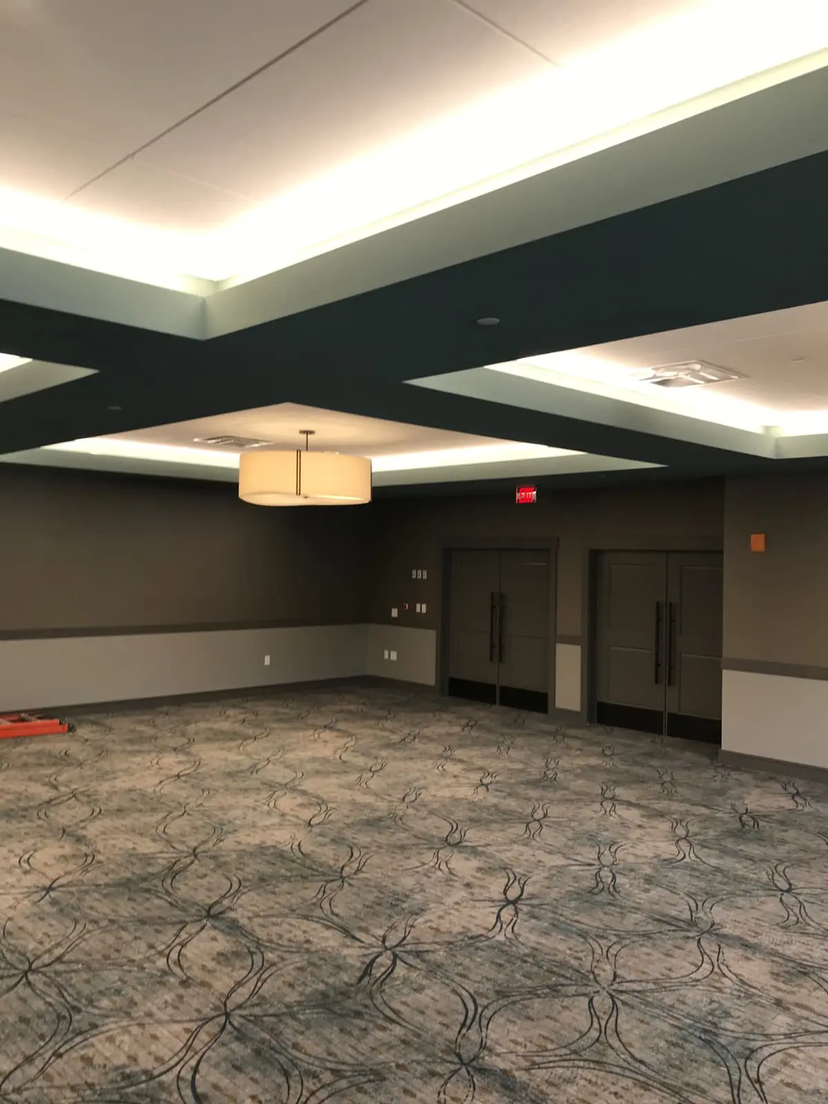 Commercial event space finished in layered gray tones