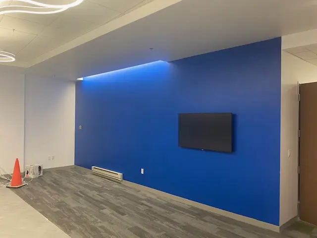 Finished blue feature wall in a commercial interior