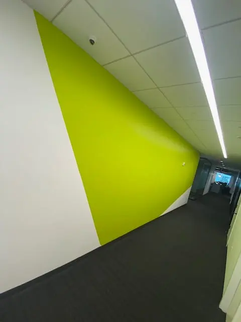 Commercial hallway with a fresh lime green accent wall