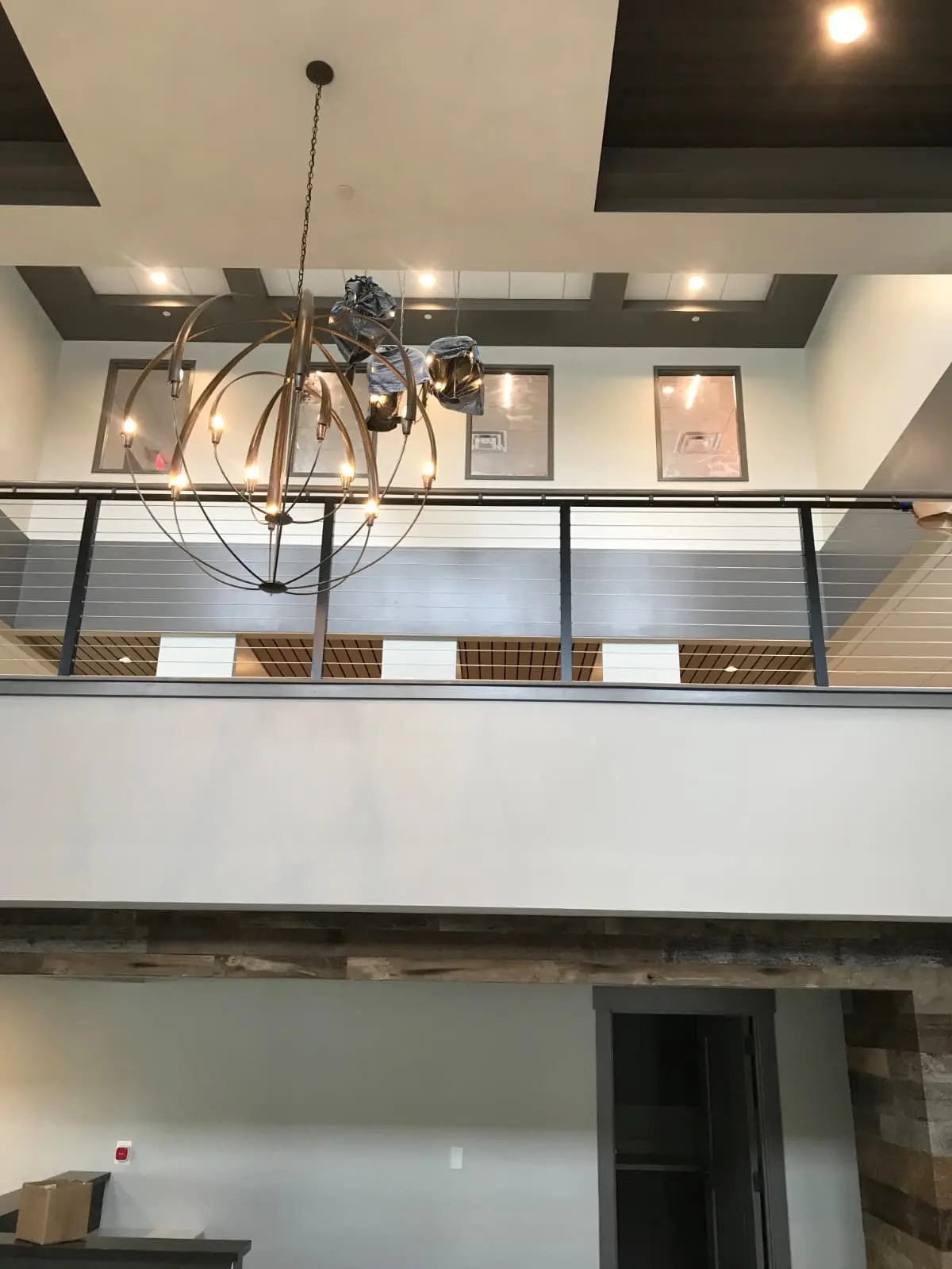 Modern commercial interior with crisp white and charcoal finishes