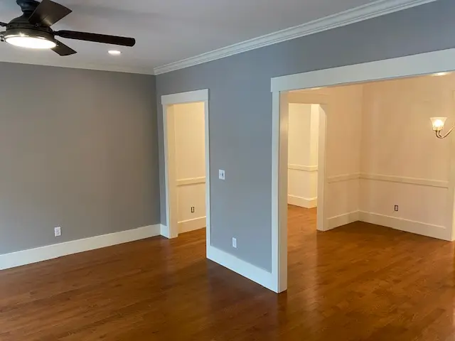 Freshly painted gray and white residential living room